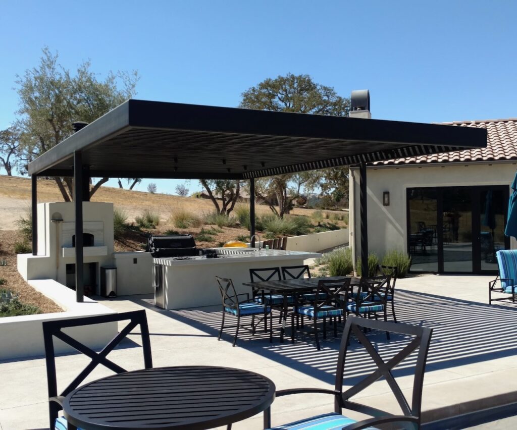 Custom-designed metal pergola by J&M Welding Inc. for luxury outdoor kitchens in San Luis Obispo.