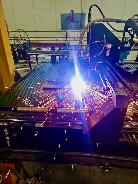 Certified welder performing precision welding with protective mask in San Luis Obispo County