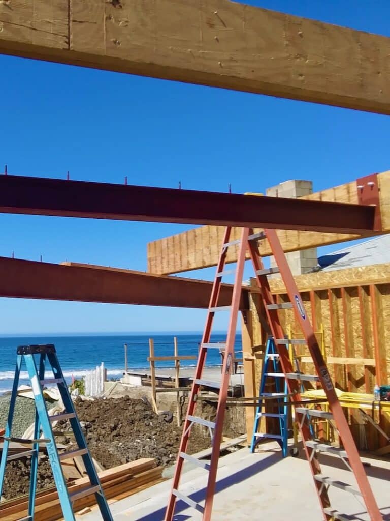 Custom-designed metal patio cover by J&M Welding, featuring precision structural steel welding for residential outdoor spaces.