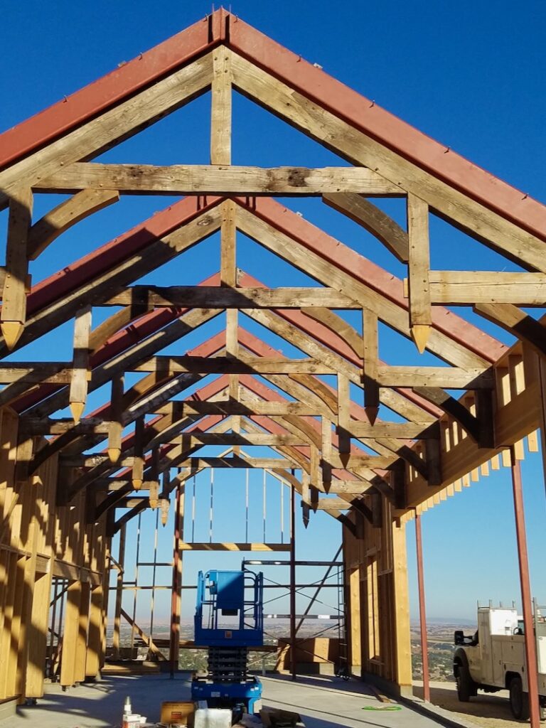 Initial welding stage for roof joists by J&M Welding Inc., showcasing the precision in commercial structural steel projects.