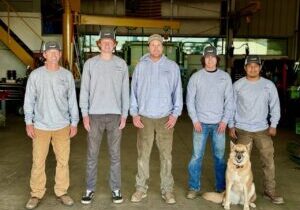 Skilled welding team of J&M Welding Inc. at work in Paso Robles shop, employing advanced MIG and TIG welding techniques on diverse metal projects.