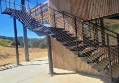 custom fabricated metal staircase with custom handrails completed at winery.